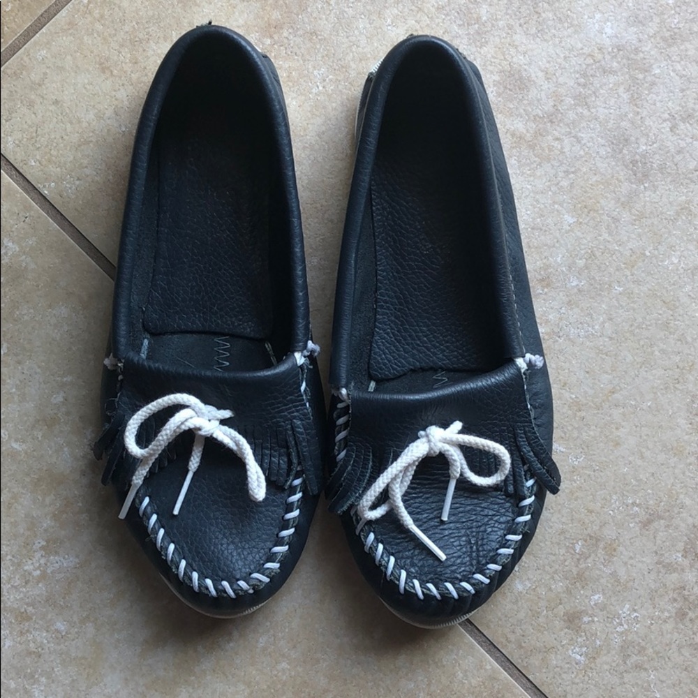 Blue and white Minnetonka Moccasins